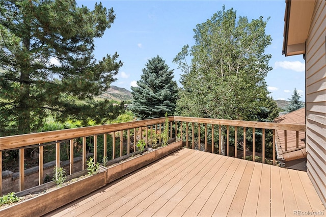 5569 Willow Springs Dr, Morrison, CO 80465 - wooden deck featuring a mountain view