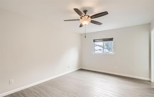 3235 S Newland St, Denver, CO 80227 - unfurnished room with wood finished floors and ceiling fan