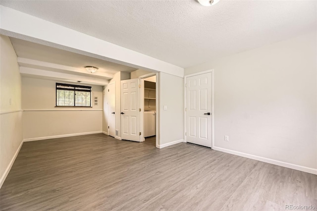 3235 S Newland St, Denver, CO 80227 - unfurnished room featuring wood finished floors and a textured ceiling