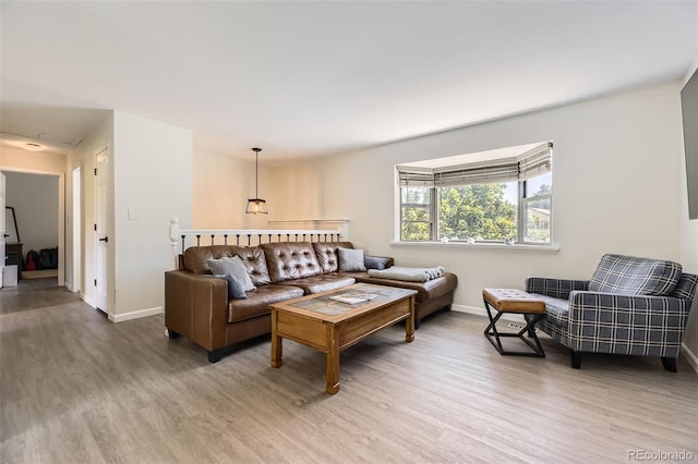 3235 S Newland St, Denver, CO 80227 - living area featuring wood finished floors and baseboards