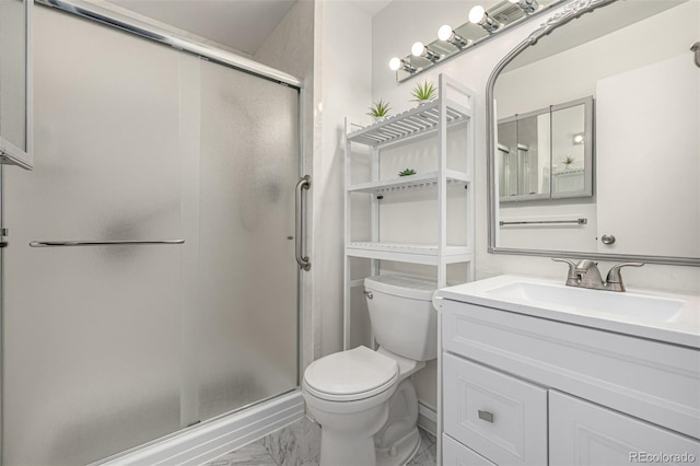 full bathroom with vanity, a shower stall, toilet, and marble finish floor