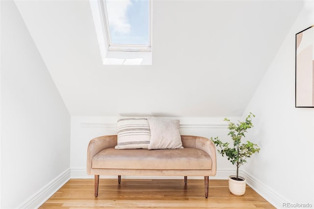 3346 W 30th Ave, Denver, CO 80211 - sitting room with wood finished floors, a skylight, and vaulted ceiling