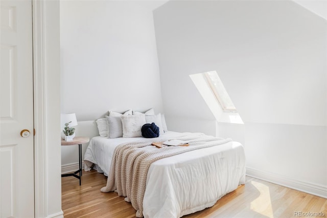 3346 W 30th Ave, Denver, CO 80211 - bedroom featuring a skylight and light wood finished floors