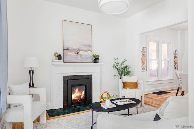 3346 W 30th Ave, Denver, CO 80211 - living area featuring wood finished floors and a glass covered fireplace