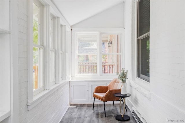 3346 W 30th Ave, Denver, CO 80211 - sunroom with vaulted ceiling, healthy amount of natural light, and wood finished floors