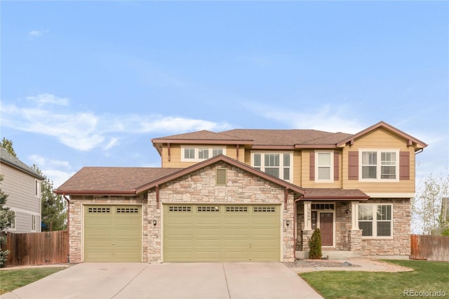 13664 Cherry St, Thornton, CO 80602 - view of front of home with stone siding, an attached garage, fence, concrete driveway, and roof with shingles