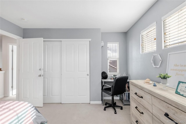13664 Cherry St, Thornton, CO 80602 - bedroom featuring light carpet, baseboards, and a closet