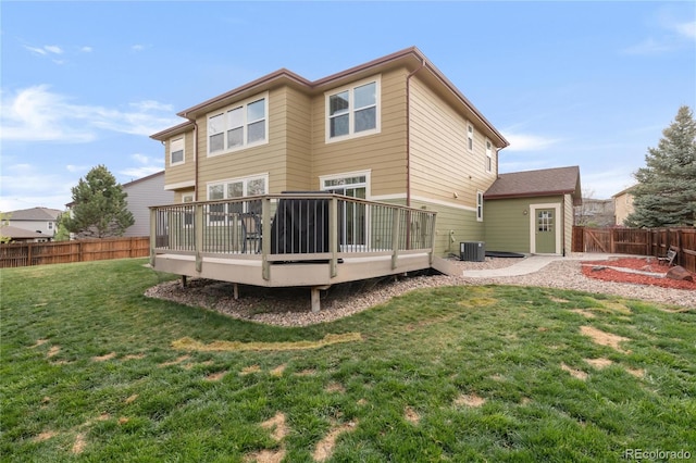 13664 Cherry St, Thornton, CO 80602 - back of house with central AC unit, a wooden deck, a fenced backyard, and a lawn