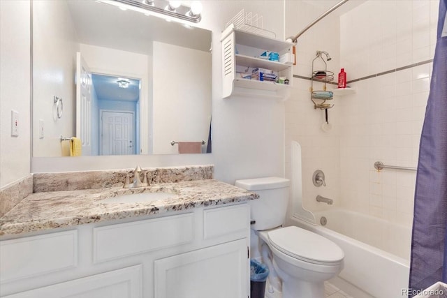 full bathroom featuring shower / bath combination with curtain, vanity, and toilet