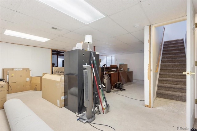 basement with a drop ceiling