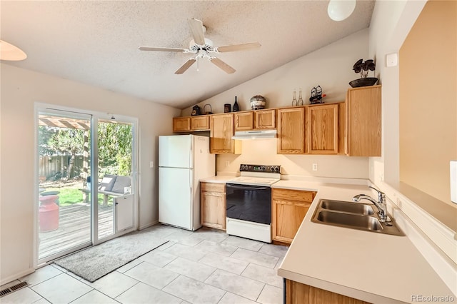 kitchen featuring white appliances, sink, a textured ceiling, ceiling fan, and vaulted ceiling