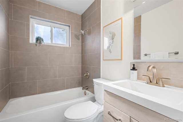 full bathroom featuring decorative backsplash, vanity, toilet, and tiled shower / bath combo