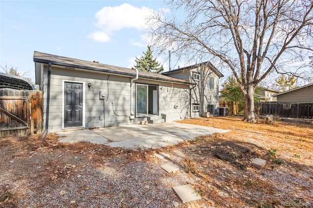 back of house featuring a patio area and central AC unit