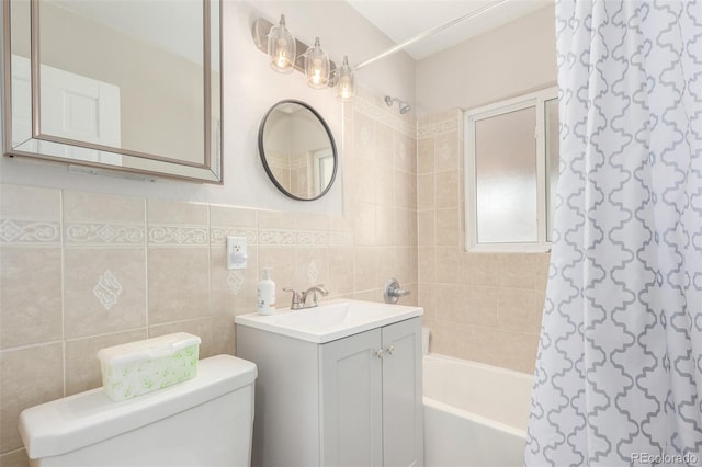 full bathroom with toilet, shower / tub combo, tile walls, tasteful backsplash, and vanity
