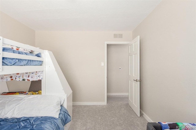 3041 S Glencoe St, Denver, CO 80222 - bedroom with light carpet and baseboards