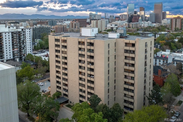 property's view of city with a mountain view