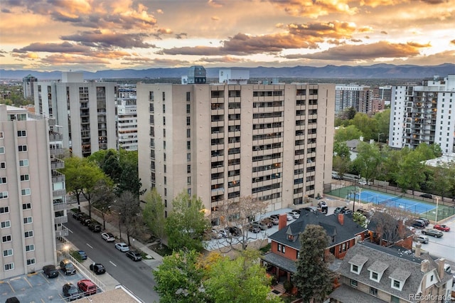 outdoor building at dusk featuring a mountain view