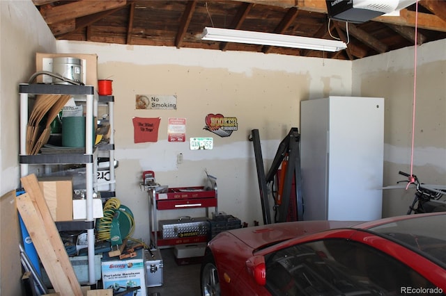 garage featuring a garage door opener