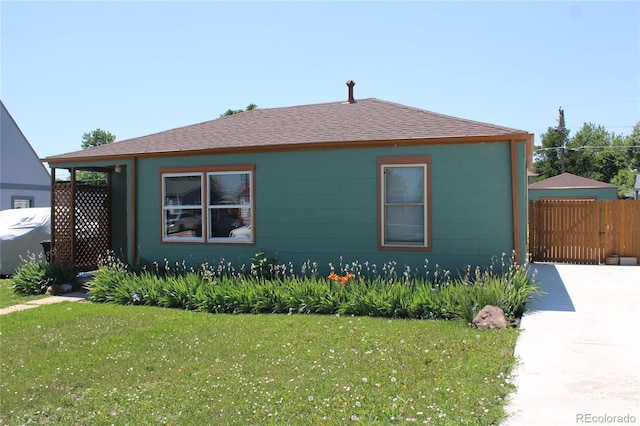 1730 W 51st Ave, Denver, CO 80221 - view of home's exterior with roof with shingles