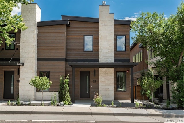 21 Washington Ave, Golden, CO 80403 - contemporary house with a chimney and a porch