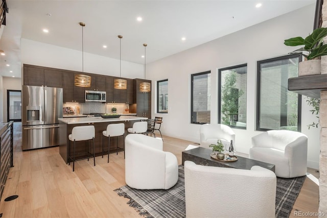 21 Washington Ave, Golden, CO 80403 - living area with light wood finished floors and recessed lighting