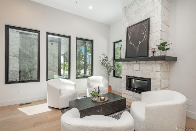 21 Washington Ave, Golden, CO 80403 - living area featuring a fireplace and wood finished floors