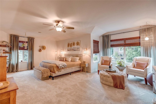 8229 Cottongrass Ct, Castle Pines, CO 80108 - bedroom featuring multiple windows, carpet flooring, and a ceiling fan