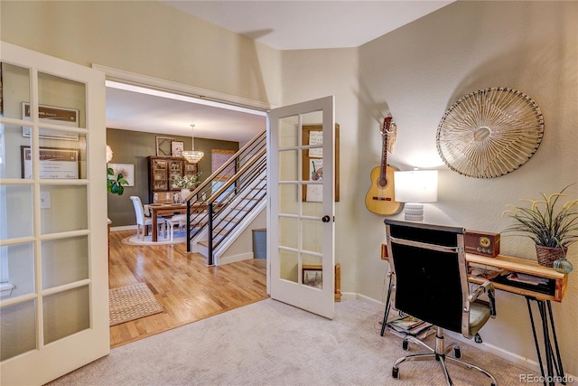 8229 Cottongrass Ct, Castle Pines, CO 80108 - carpeted home office featuring french doors and a chandelier