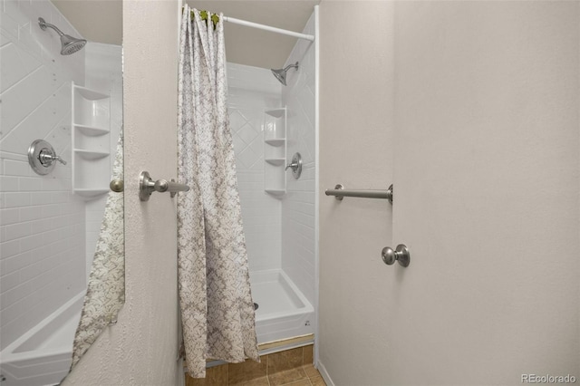 1026 Spencer St, Longmont, CO 80501 - bathroom featuring a stall shower and tile patterned flooring
