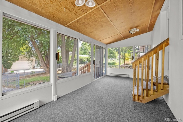 1026 Spencer St, Longmont, CO 80501 - unfurnished sunroom with a baseboard radiator, plenty of natural light, and vaulted ceiling