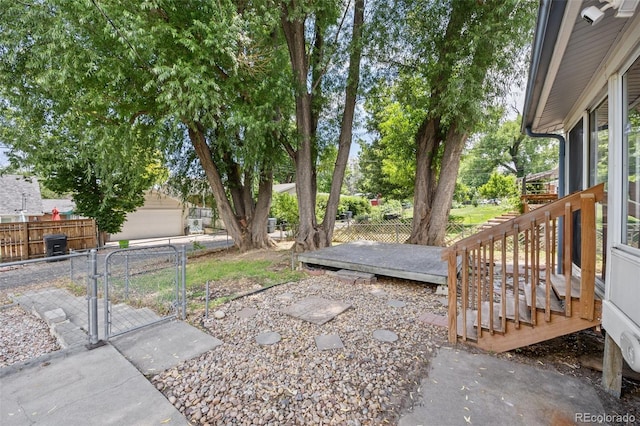 1026 Spencer St, Longmont, CO 80501 - view of yard featuring a gate and a deck