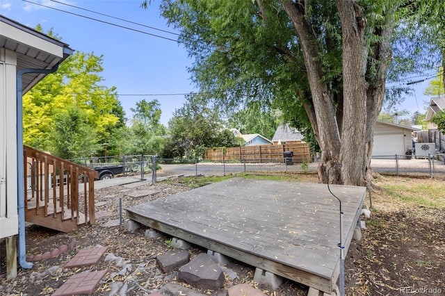 1026 Spencer St, Longmont, CO 80501 - fenced backyard featuring a wooden deck