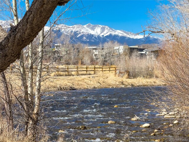 mountain view with a water view