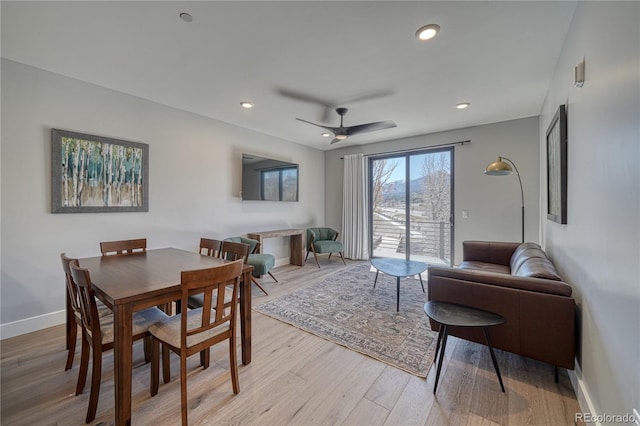 dining area featuring light wood-type flooring, ceiling fan, baseboards, and recessed lighting