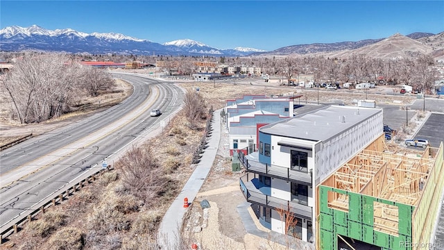 drone / aerial view featuring a mountain view