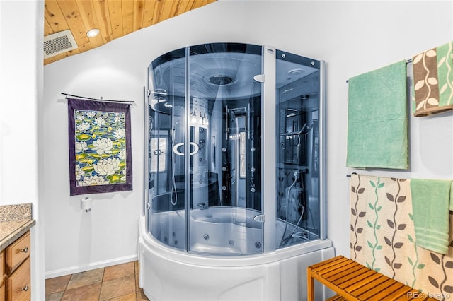 180 Ridge Rd, Cimarron, CO 81220 - bathroom with baseboards, vanity, a combined bath / shower with jetted tub, and wooden ceiling