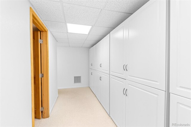 180 Ridge Rd, Cimarron, CO 81220 - hallway with a drop ceiling, baseboards, and light carpet