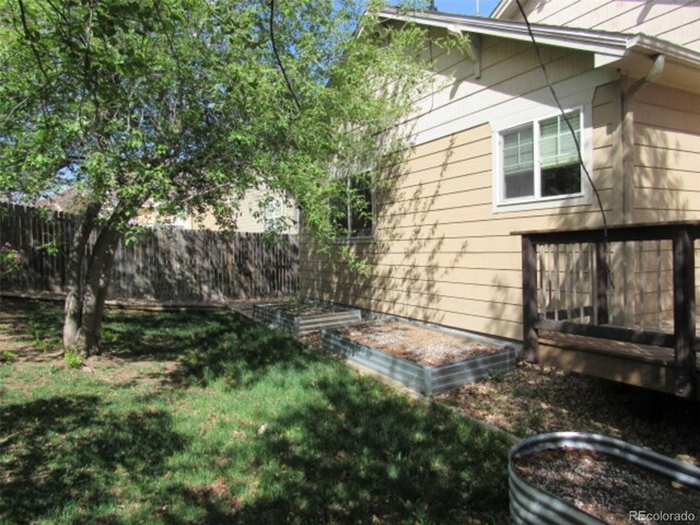 view of yard with fence