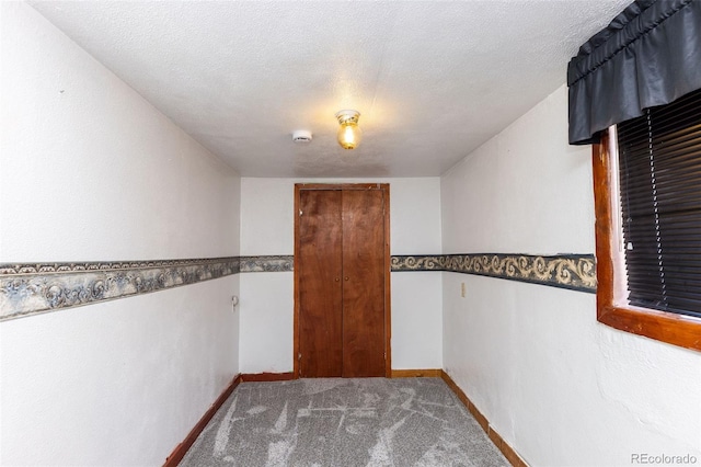 379 Sisneros St, Center, CO 81125 - hallway with carpet floors and baseboards