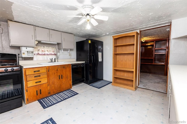 379 Sisneros St, Center, CO 81125 - kitchen featuring black appliances, light floors, ceiling fan, light countertops, and a textured ceiling