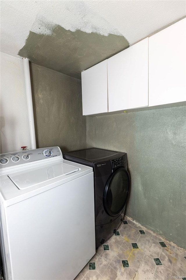 379 Sisneros St, Center, CO 81125 - washroom featuring cabinet space and washer and dryer