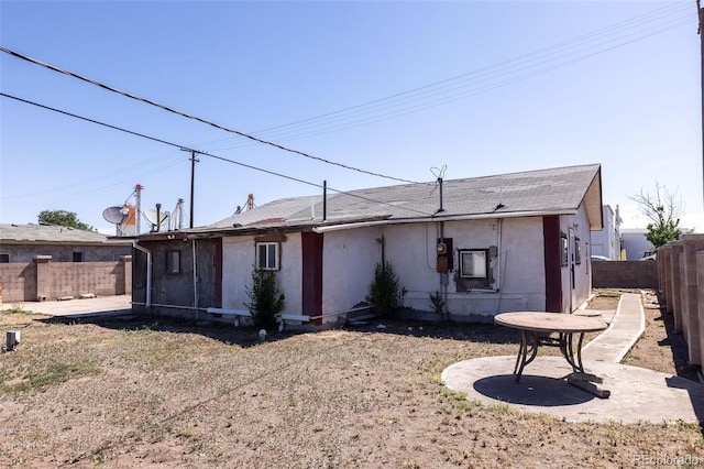 379 Sisneros St, Center, CO 81125 - back of property featuring a fenced backyard and a patio