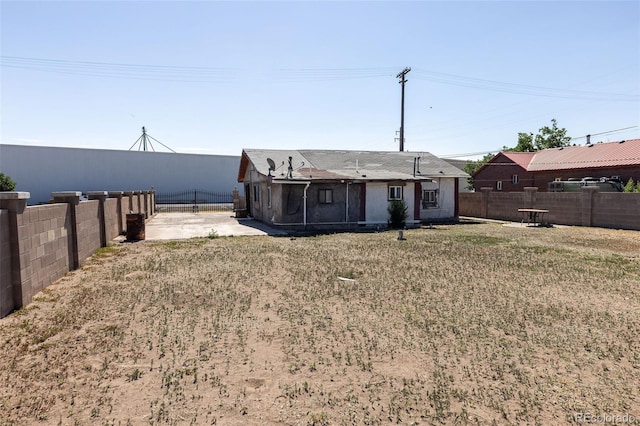 379 Sisneros St, Center, CO 81125 - fenced backyard with a patio area