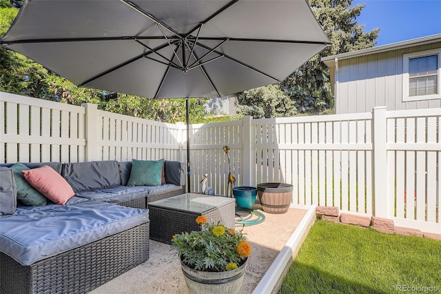 2853 S Xanadu Way, Aurora, CO 80014 - view of patio featuring outdoor lounge area