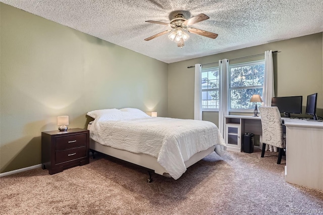 2853 S Xanadu Way, Aurora, CO 80014 - bedroom with light colored carpet, a textured ceiling, and ceiling fan