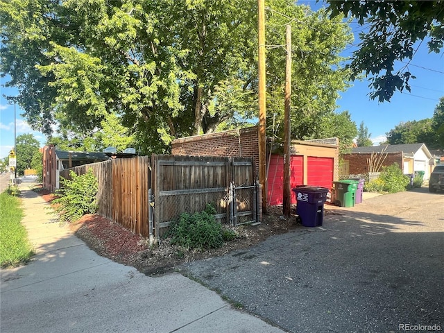 292-296 S Lafayette St, Denver, CO 80209 - view of yard with a gate and a garage