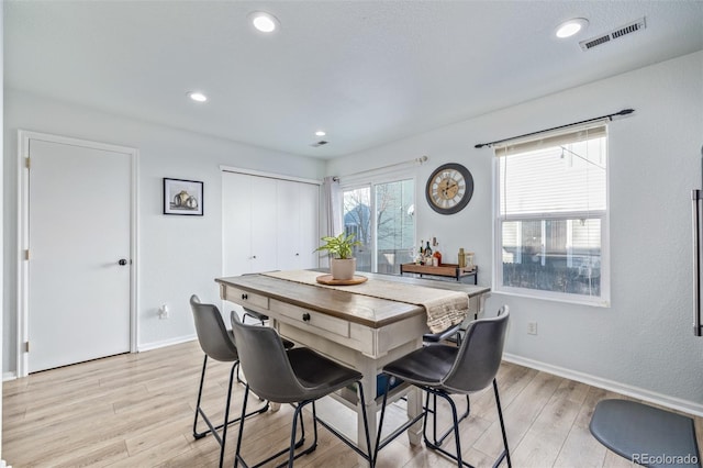 dining room featuring light hardwood / wood-style flooring