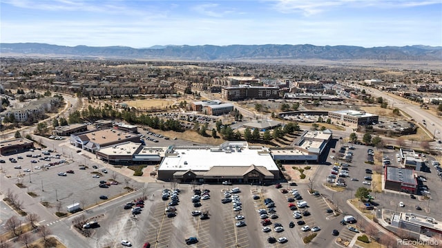 drone / aerial view featuring a mountain view