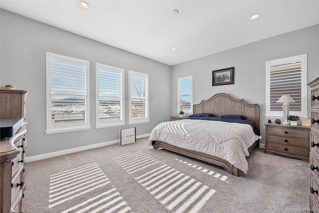 bedroom featuring light carpet