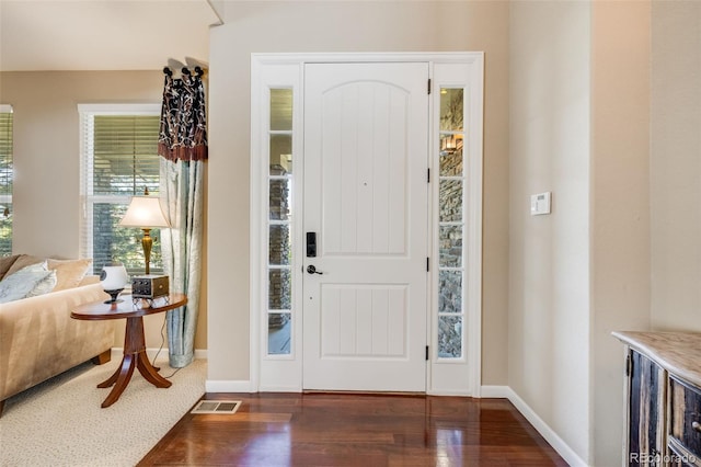 26764 E Canyon Ave, Aurora, CO 80016 - foyer featuring dark wood finished floors and baseboards